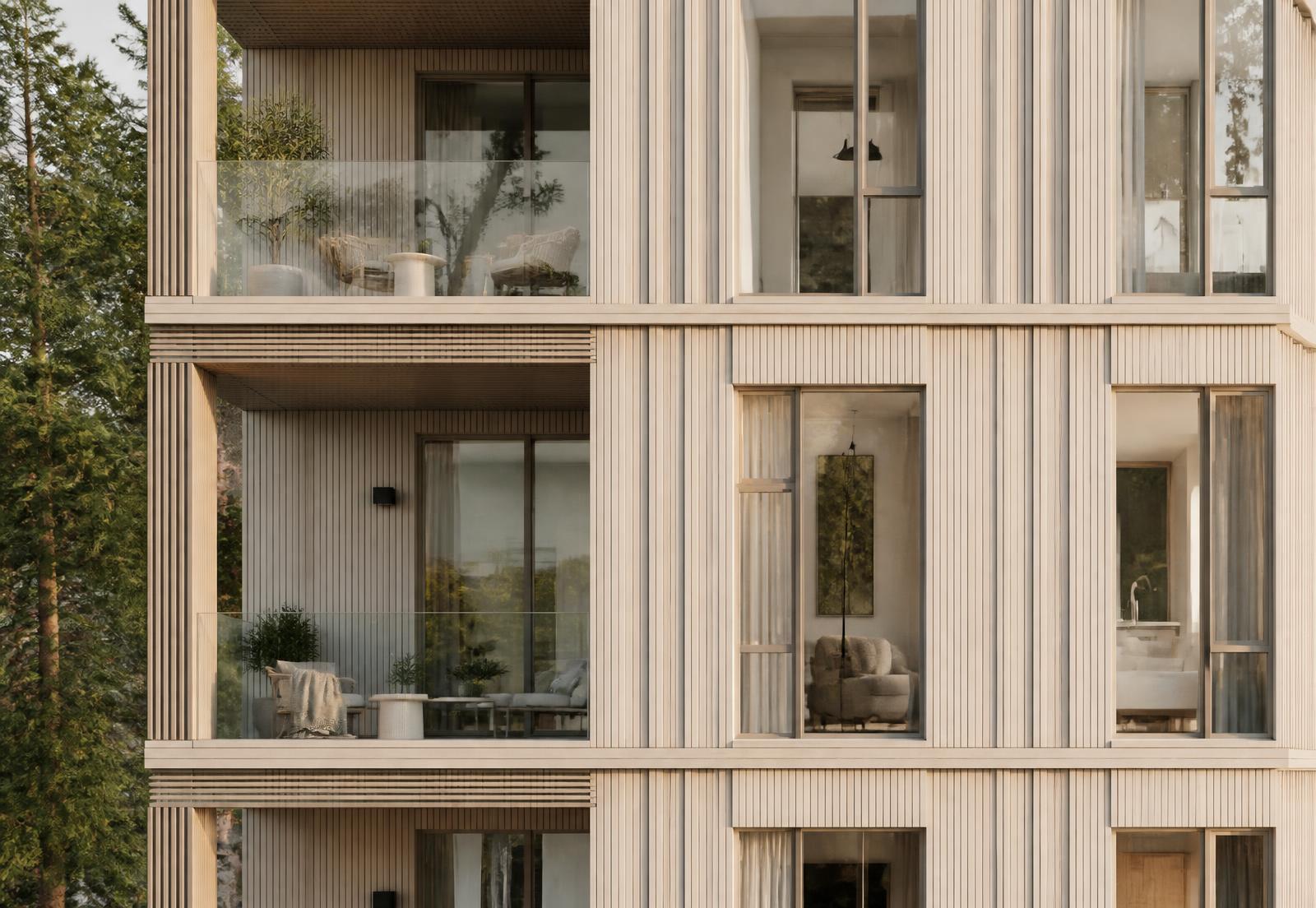 Modern flerbostadsfastighet i ljust trä och glas